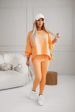 BLUZA BAWEŁNIANA MERRY OVERSIZE ASYMETRYCZNA Z ROZCIĘCIAMI PO BOKACH POMARAŃCZOWA