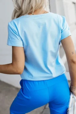 T-SHIRT BAWEŁNIANY WOMAN BŁĘKITNY